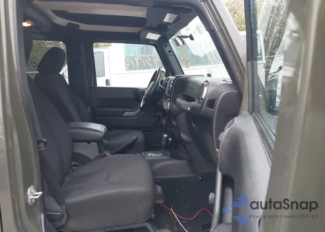 2015 Jeep Wrangler Unlimited Willys Wheeler from USA, damaged, VIN 1C4BJWDG1FL768254